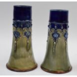 A near pair of Royal Doulton stoneware vases of hunting horn form, tallest 15cm tall (2). In good