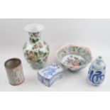 A collection of oriental pottery to include a shaped edge bowl, a large enamelled style vase, a
