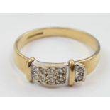 9ct gold ladies buckle ring set with diamonds, 2.3 grams, size P.