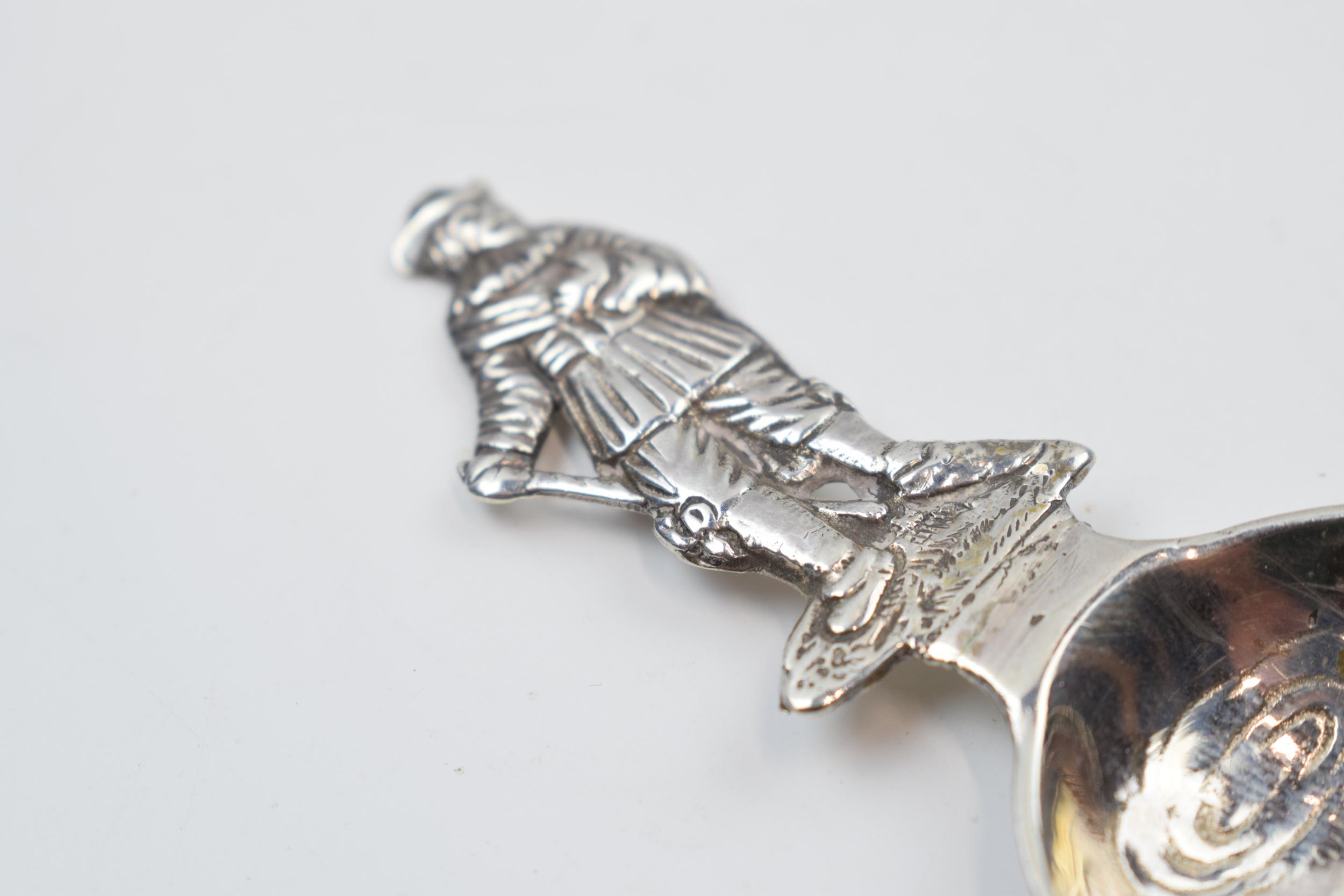 Dutch silver novelty caddy spoon with figural finial, 9.5cm long, 14.8 grams. Repair to handle. - Image 2 of 3