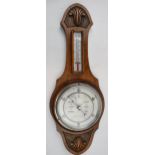 British made barometer and thermometer. Light oak mount and marked 551 to reverse. crack to