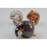 Royal Crown Derby Paperweights in the form of a Badger, a Red Squirrel and a Squirrel first
