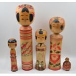 Vintage Japanese Kokeshi dolls. To include signed examples. Height of tallest 50cm In good