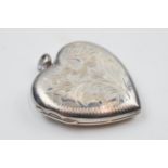 Large silver heart locket with hinged, hallmarks to rear, 15.8 grams.