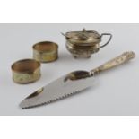 A collection of hallmarked silver items to include a cruet, a pair of napkin rings, weighable silver