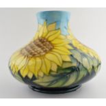 Large Moorcroft squat vase in the Sunflowers design, 25cm diameter. In good condition with no