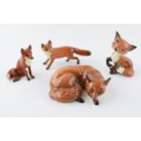 Beswick foxes to include comical fox 173, lying fox 1017 and 2 others (4). In good condition with no
