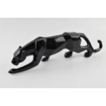Anita Harris model of a black panther stalking, signed in gold, 43cm long. In good condition with no