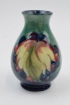 Moorcroft Leaf and Berries vase, 7/4, signed by William Moorcroft, 10cm tall. In good condition with