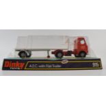 Dinky 915 A.E.C. with Flat Trailer, (orange cab, white interior, silver trim, cast hubs) 'Truck Hire