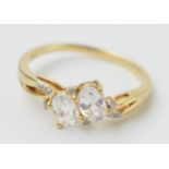 9ct gold ladies ring set with illusion set diamonds and larger white stones, 2.7 grams, size T,