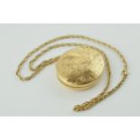 9ct gold large locket with engraved floral decoration on 9ct gold link necklace, 34.2 grams, with