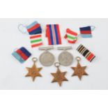 A collection of WWII medals to include The 1939 - 1945 Star, Africa Star, Italy Star, Defence