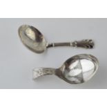 A pair of silver caddy spoons to include a Georgian Birmingham 1809 Cocks & Bettridge spoon with a