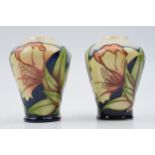 Moorcroft 'Ode To May' pair of ovoid vases, 576/4 (2), 11cm tall. In good condition with no