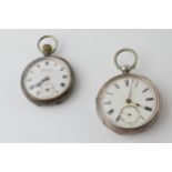 A pair of sterling silver pocket watches to include a 5cm diameter example, London 1887, and a