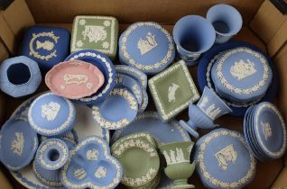 A collection of Wedgwood Jasperware pieces to include vases, lidded pots, trinket trays, dishes, pin