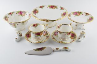 An extensive collection of Royal Albert Old Country Roses tea and dinner ware to include cups,