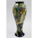 Boxed Moorcroft trial vase in the Shirewood pattern, 75/10, 27.5cm tall. In good condition with no