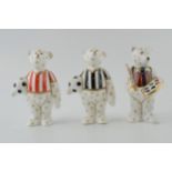 Royal Crown Derby miniature bear paperweights in the form of a Footballer with black and white