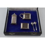 Cased Art Deco silver cruet set, 2 with blue glass liners, in presentation case, Birmingham 1935,