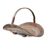 Copper basket with decorative handle. Repoussé design with birds and stars sitting on four ball