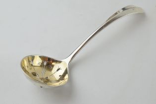 Silver sifter spoon, original gilding to bowl, rat tail handle, Sheffield 1928, 52.4 grams.