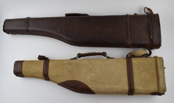 Two vintage leg of mutton gun slips. One in leather and one in canvas finish. Leather embossed