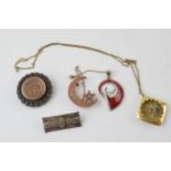 A collection of silver jewellery to include a masonic pendant, a hardstone shell, gold fronted