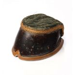 Victorian taxidermy horse's hoof pin cushion with brass shoe and velvet cushion, 14cm long.