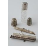 2 silver needle cases, both marked 925, with hoops for chatelaine, with a silver topped scent bottle