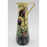 Boxed Moorcroft jug in the Cricklade pattern, JU3, 24cm tall, signed by Emma Bossons. In good