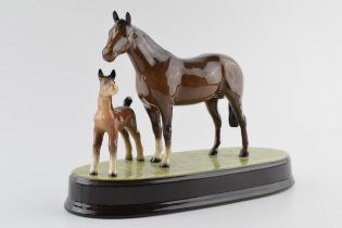 Beswick brown foal and mare on ceramic base. In good condition with no obvious damage or
