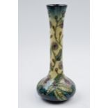 Boxed Moorcroft tall vase in the Fiji pattern, 99/8, No. 111, 20.5cm tall. In good condition with no