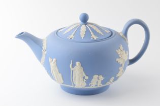 Wedgwood Jasperware teapot in blue. In good condition, potential sanded down spout to left side.
