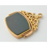 9ct gold swivel fob with bloodstone and ornate link, 6.6 grams, 3cm tall.