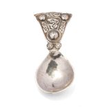 Hallmarked silver caddy spoon in Arts and Crafts style, 16.8 grams, Birmingham 1936.