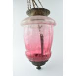 Early 20th century cranberry glass porch light with etched decoration, 30.5cm tall exclude chains.