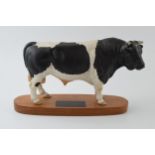 Beswick Connoisseur model of a Friesian Bull on wooden base. In good condition with no obvious