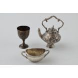 Miniature silver items to include a goblet, Birm 1905, a sugar bowl with 2 handles, and a foreign