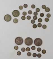 A quantity of UK silver coinage. To include 54g of 1920 - 1947 coins and 55g of pre 1920 coinage. Of