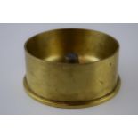 Large 1958 brass shell base / trench art, 16.5cm diameter.