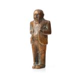 Bronze figure of Sir Winston Churchill with a cigar, made from a sand casting, impressed 'CT