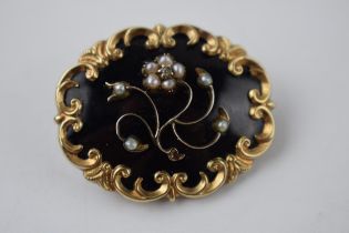 Victorian yellow coloured metal mourning brooch with enamelled decoration with pearls, inscribed '