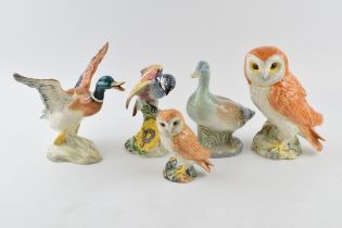 Beswick to include flying mallard 749 (1 wing af), a large barn owl, small barn owl, a Chickadee (