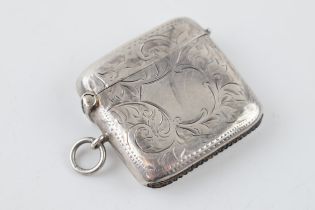 Hallmarked silver vesta case with engraved decoration, 20.8 grams, Birmingham 1910.