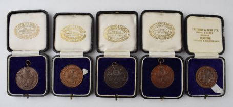 Bronze 'Police Athletic Association' fobs and medals awarded too F.W Hunt. Dates ranging from 1926 -
