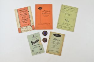 Villiers User's Handbooks together with a Vespa owners manual and two enamel main dealer advertising
