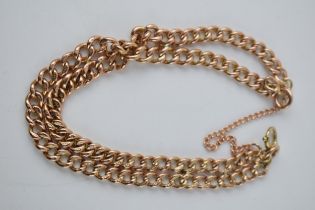 9ct gold double link bracelet with safety chain, 18.2 grams.