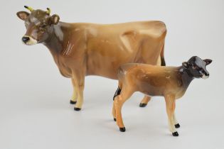 Beswick Jersey Cow 1345 (restored leg) with Jersey Calf 1249D (2). Calf in good condition with no
